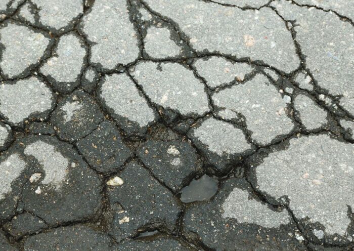 cracked driveway blacktop